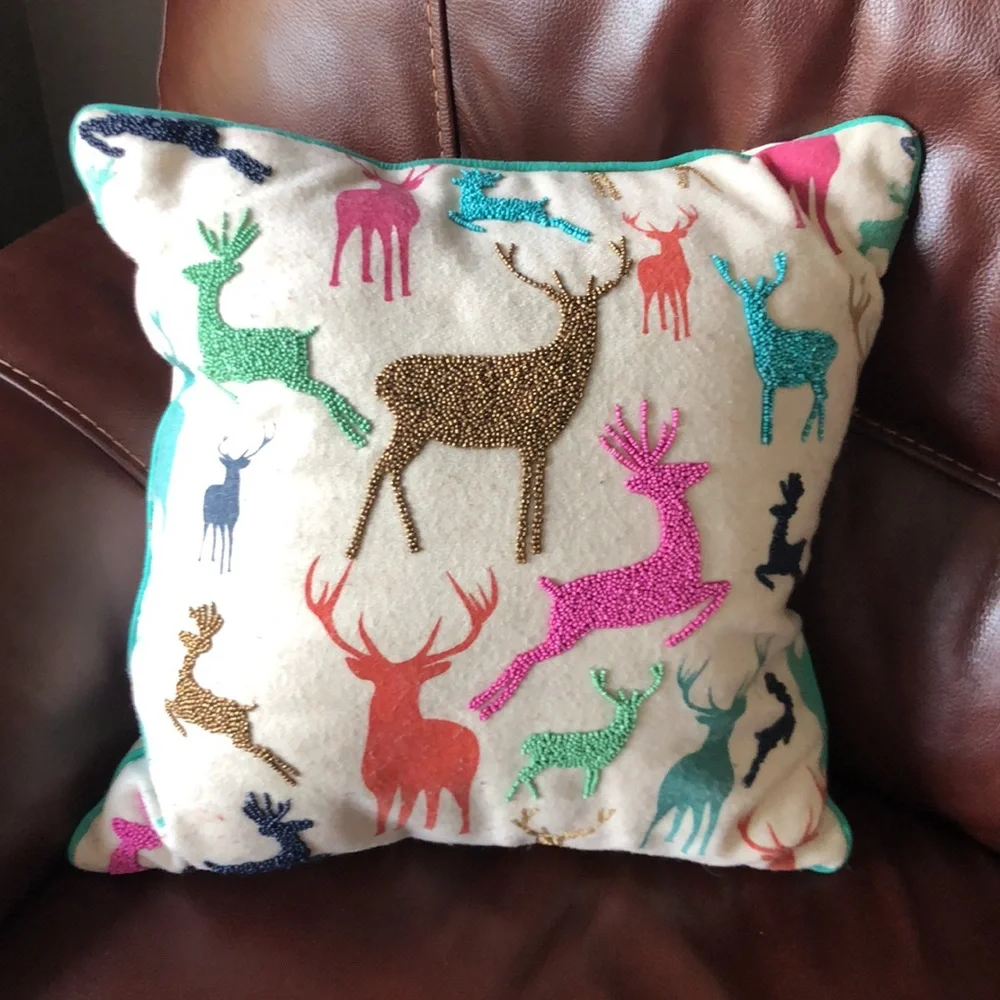 Reindeer multicolor throw pillows